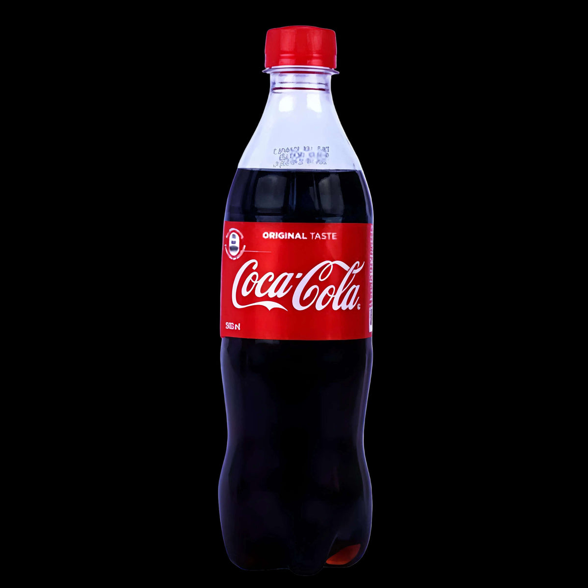 A 500 ml bottle of Coca-Cola Original Taste on a plain white background.